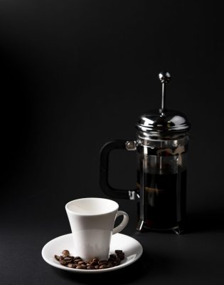 front-view-cup-coffee-with-kettle